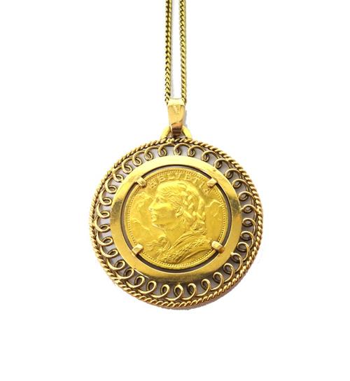 A Swiss gold twenty francs 1927, in a gold pendant mount, fitted to a gold curb link neckchain, on a boltring clasp, the clasp detailed 18 K, combined
