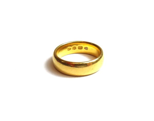 A late Victorian 22ct gold plain wedding ring, London 1895, ring size M and a half, weight 9.5 gms.