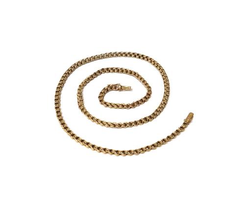 A gold neckchain, in a triple circular link design, on a snap clasp, with foldover safety catches, weight 32 gms.