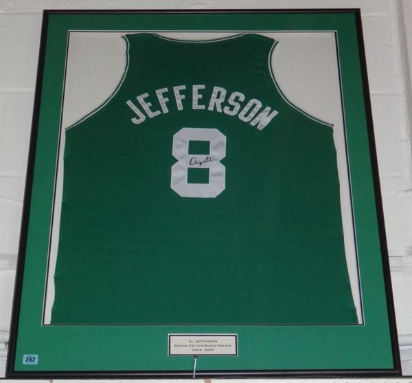 A framed basket ball shirt, signed by 'Al Jefferson'.