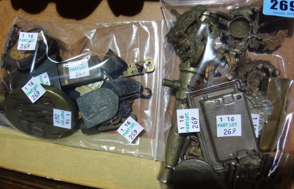 A quantity of military and trench art collectables, including bronze items, cap badges, lighters and sundry.