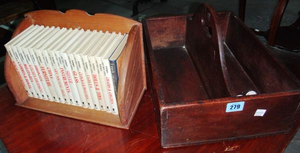 A 19th mahogany cutlery box and a book trough containing reference books.
