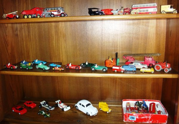 A quantity of die-cast toy vehicles.