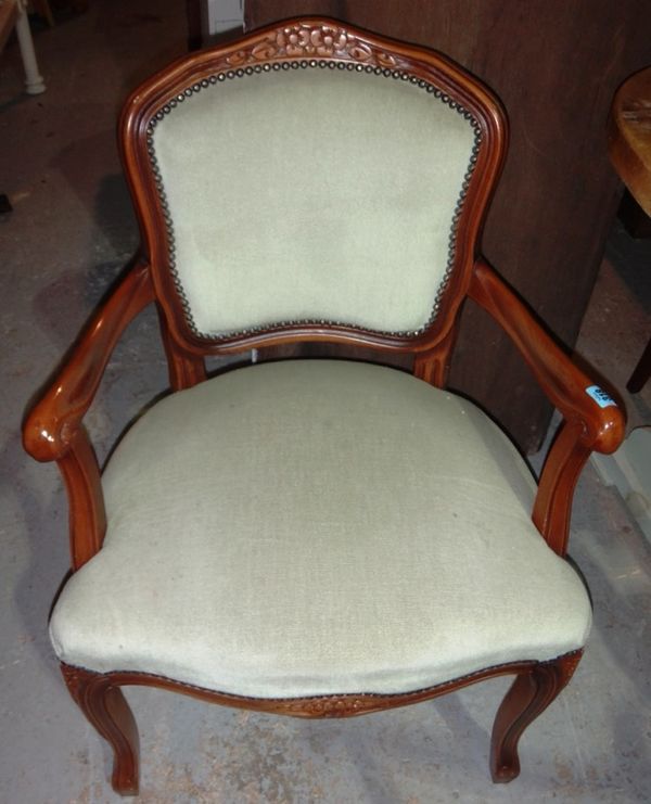 A pair of 20th century walnut fauteuils.