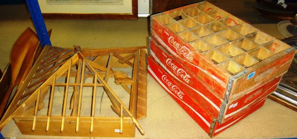 A group of three 20th century twenty four division Coca Cola bottle trays, together with an architectural model of a roof.