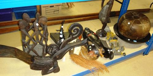A quantity of mainly carved wooden tribal items, together with a leather stool.