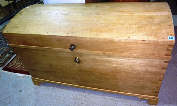 A Victorian pine dome top trunk.