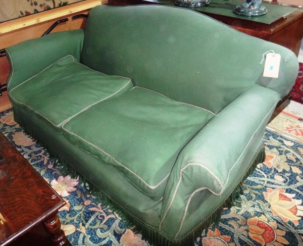 A 20th century green hump back sofa.