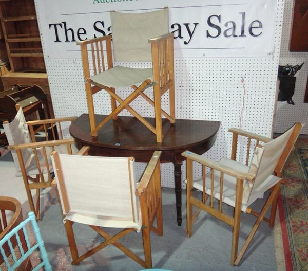 A set of four 20th century oak folding director's chairs.