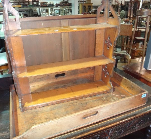 A 19th century mahogany butler's tray and a three tier walnut wall shelf.