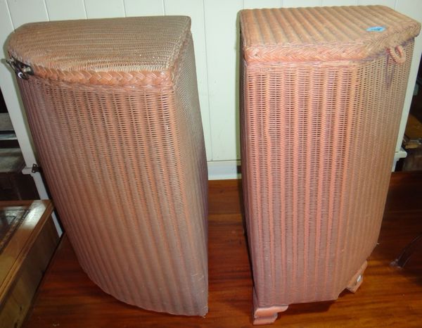 A 20th century pink Lloyd Loom corner wash basket and another basket.
