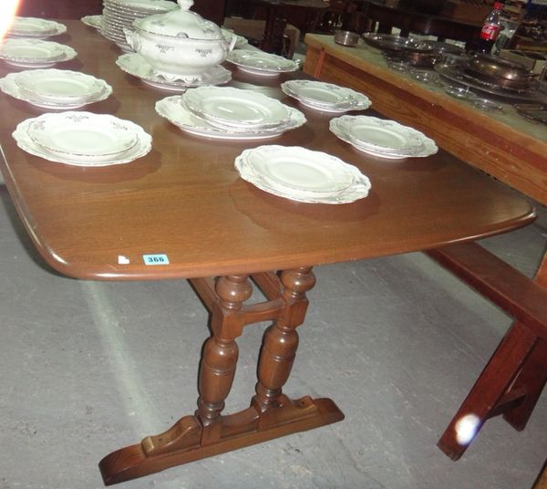 A 20th century Ercol extending dining table.