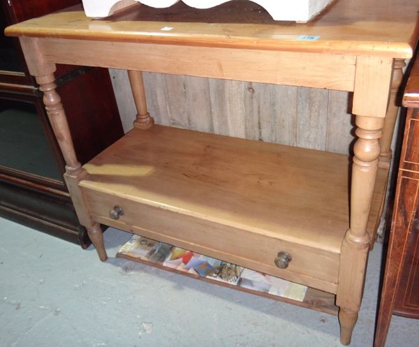 A pine two tier side table.