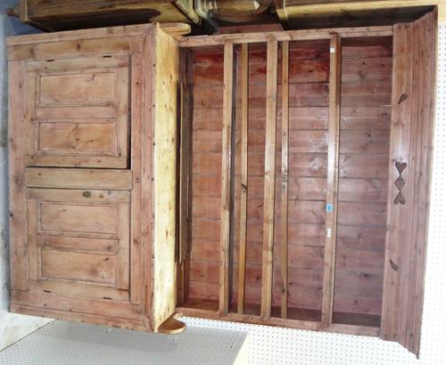 A 19th century and later Irish style pine dresser, the three tier plate rack over two cupboards, 47cm wide x 191cm high.