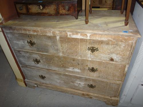 A 19th century pine chest of two short and two long drawers.