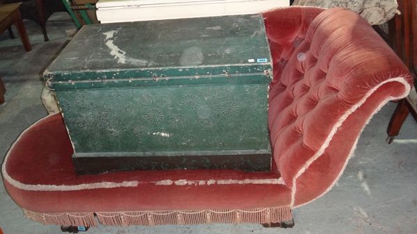 A pink upholstered button chaise longue.