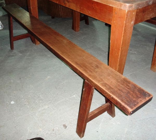 A pair of 19th century long mahogany trestle style benches.