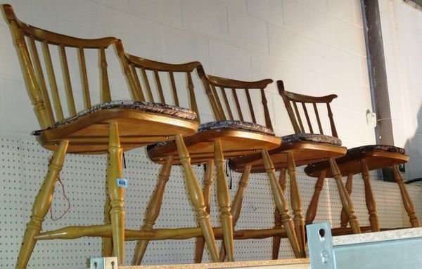 A set of four 20th century beech stick back scullery chairs.