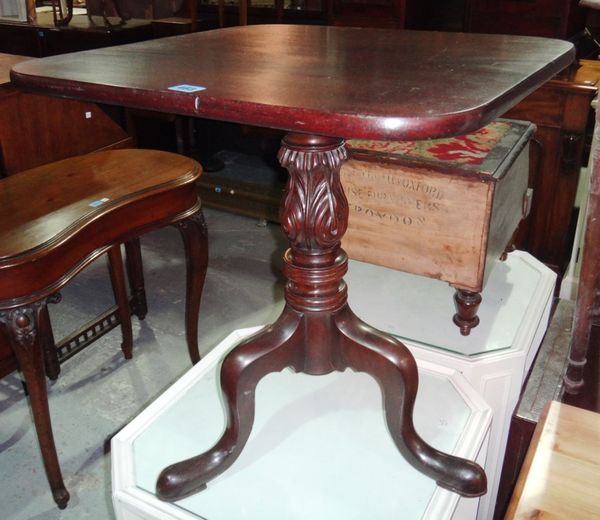 A 19th century square top tripod table.