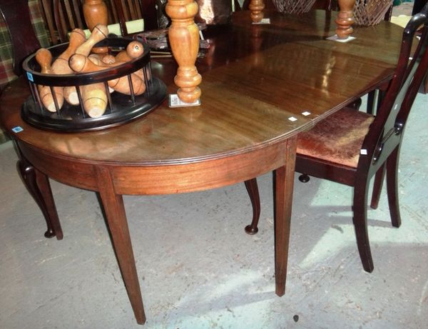 A 19th century mahogany 'D' end dining table with extra leaf.
