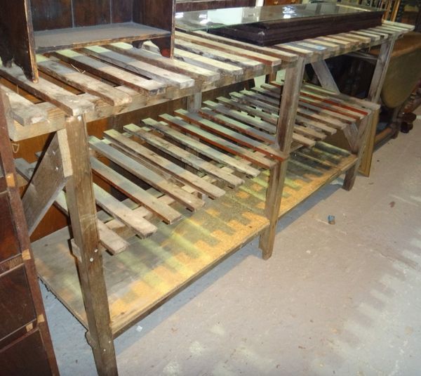 A 20th century three tier slatted potting bench.