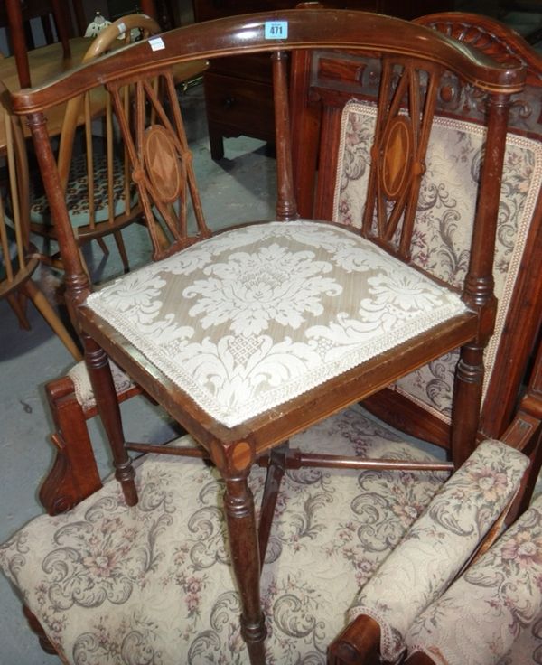 An Edwardian marquetry inlaid mahogany corner chair.