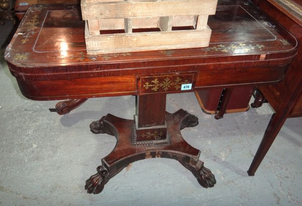A 19th century rosewood and inlaid foldover tea table.