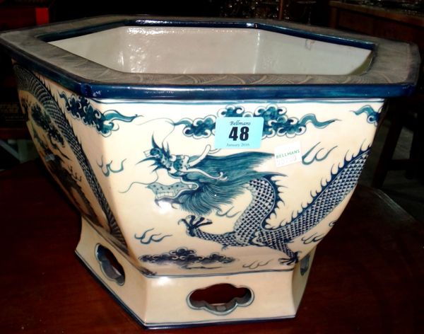 A 20th century Oriental blue and white octagonal jardiniere.