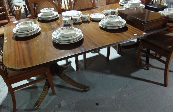 A 19th century mahogany twin pedestal 'D' end dining table with two extra leaves.