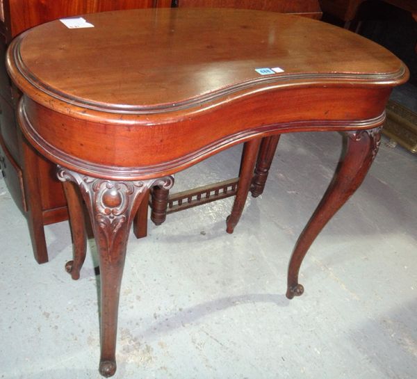 A 19th century kidney shaped occasional table on carved cabriole supports.