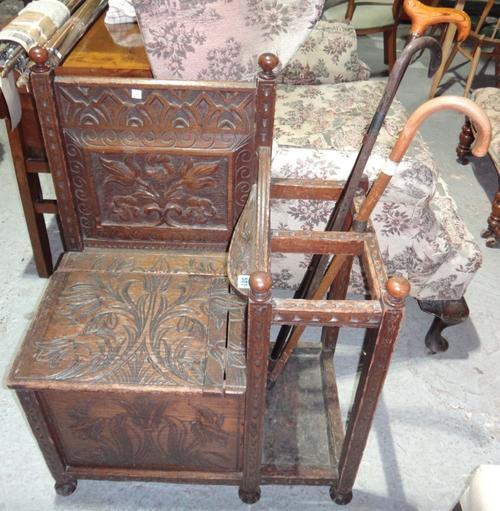 A 20th century oak settle/hall stand.