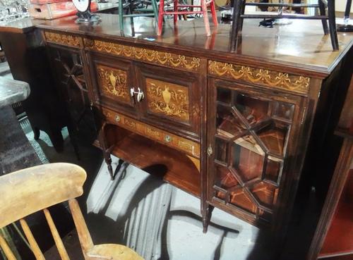 A rosewood and inlaid Victorian side cabinet.