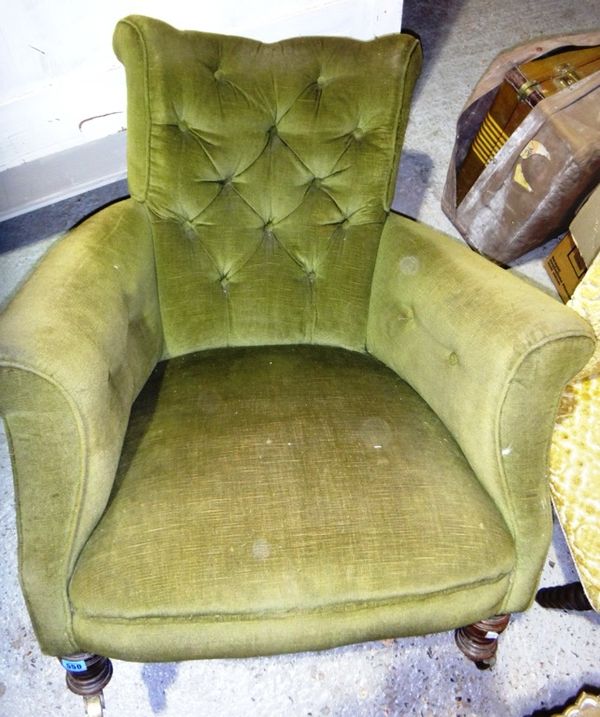 A Victorian green upholstered button back chair.