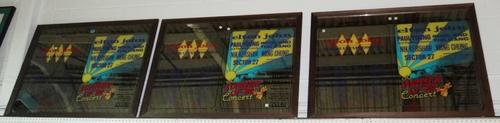 A group of three 20th century Elton John concert advertising mirrors.