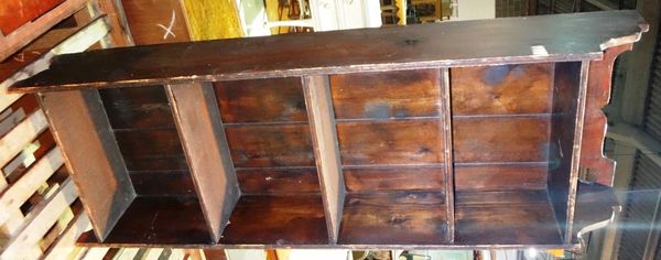 A 20th century narrow stained pine five tier bookcase.