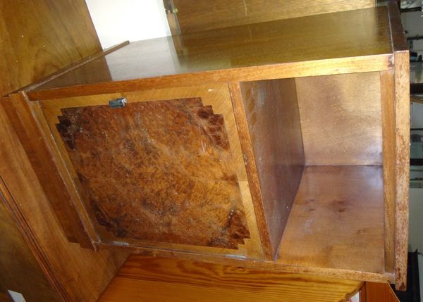 A 20th century walnut pot cupboard and a small walnut cabinet.