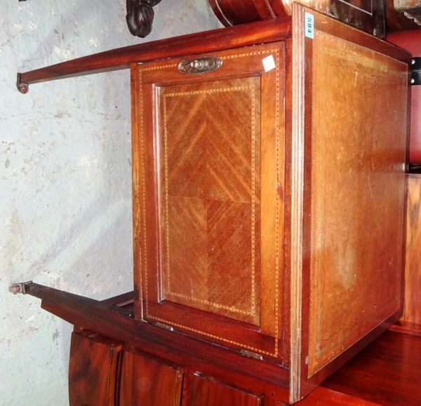An Edwardian mahogany and inlaid pot cupboard.