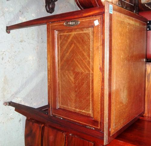 An Edwardian mahogany and inlaid pot cupboard.