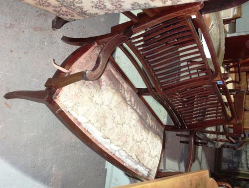 A 19th century mahogany framed two seat show frame sofa.