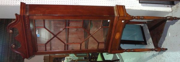 A 19th century mahogany glazed corner cabinet on stand.
