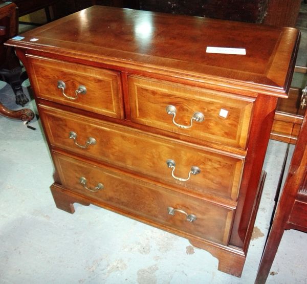 A 20th century small chest and another small hardwood bow front chest.
