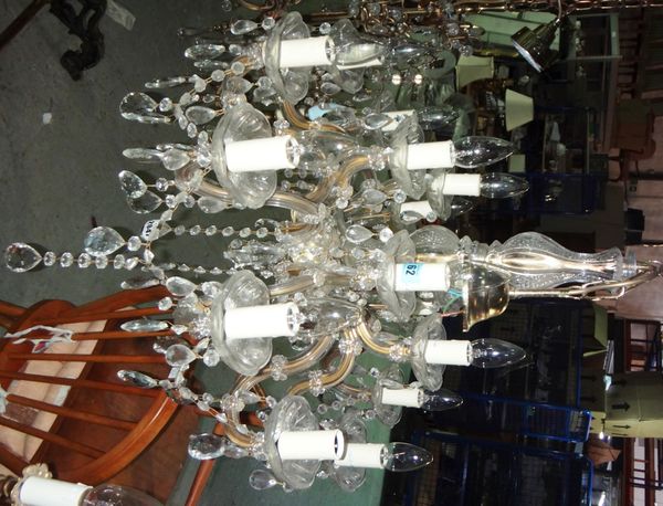 A fifteen branch gilt metal and glass chandelier.