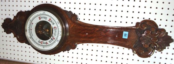 A 20th century oak wall barometer (a.f).