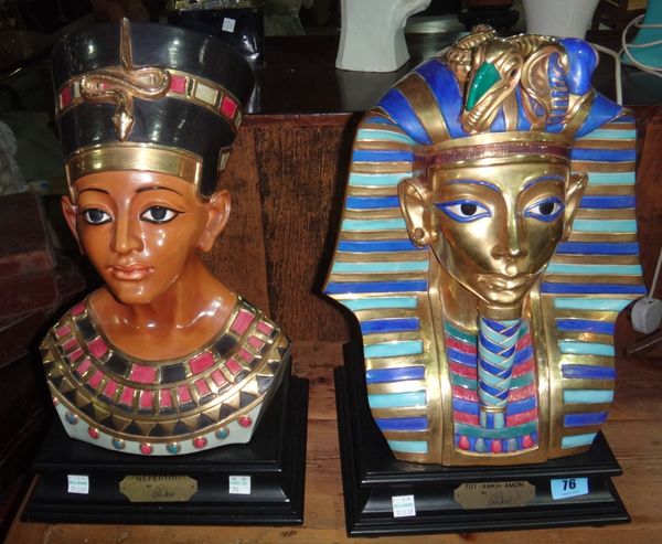 An Italian pottery bust of Tutankhamun and another of Nefertiti.