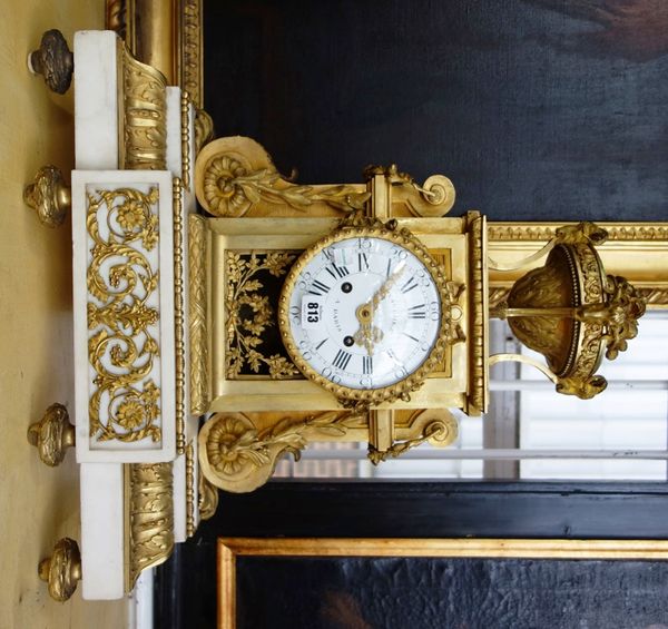 A late Louis XVI style ormolu and white marble mantel clock, circa 1790, the white enamel dial detailed 'Vauchez a Paris' enclosing a two train moveme