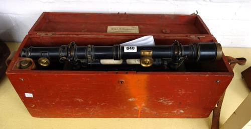 An ebonised brass theodolite by 'W. L. Girlie', late 19th century, in a fitted wooden case, 51cm wide.
