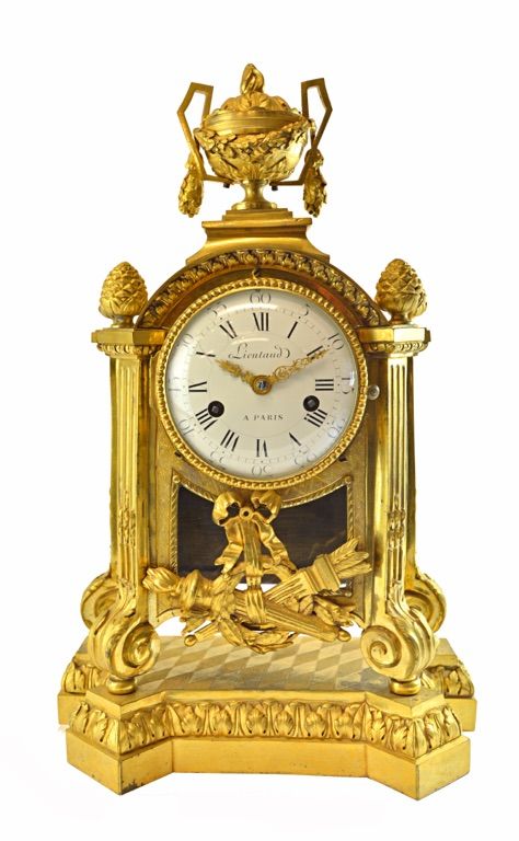A Louis XVI ormolu striking mantel clock, early 19th century, the case with urn surmount over an enamelled dial detailed 'Lietaud a Paris', with glaze
