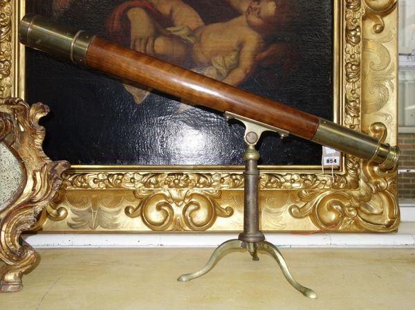 A brass and wooden bound single drawer telescope, engraved 'P. Can Optician quai St Vincent 62 Lyon', on a tripod stand, 96cm.