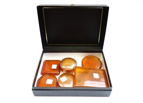 A blonde tortoiseshell and pique inlaid lidded pot, late 19th century, together with another smaller pot and five other hinged pots (7).  SN00509387/0