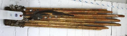 A pair of Italian giltwood and tin mounted wall appliques, 19th century, the slender shaped backplate issuing patinated tin sconces (one lacking), uni